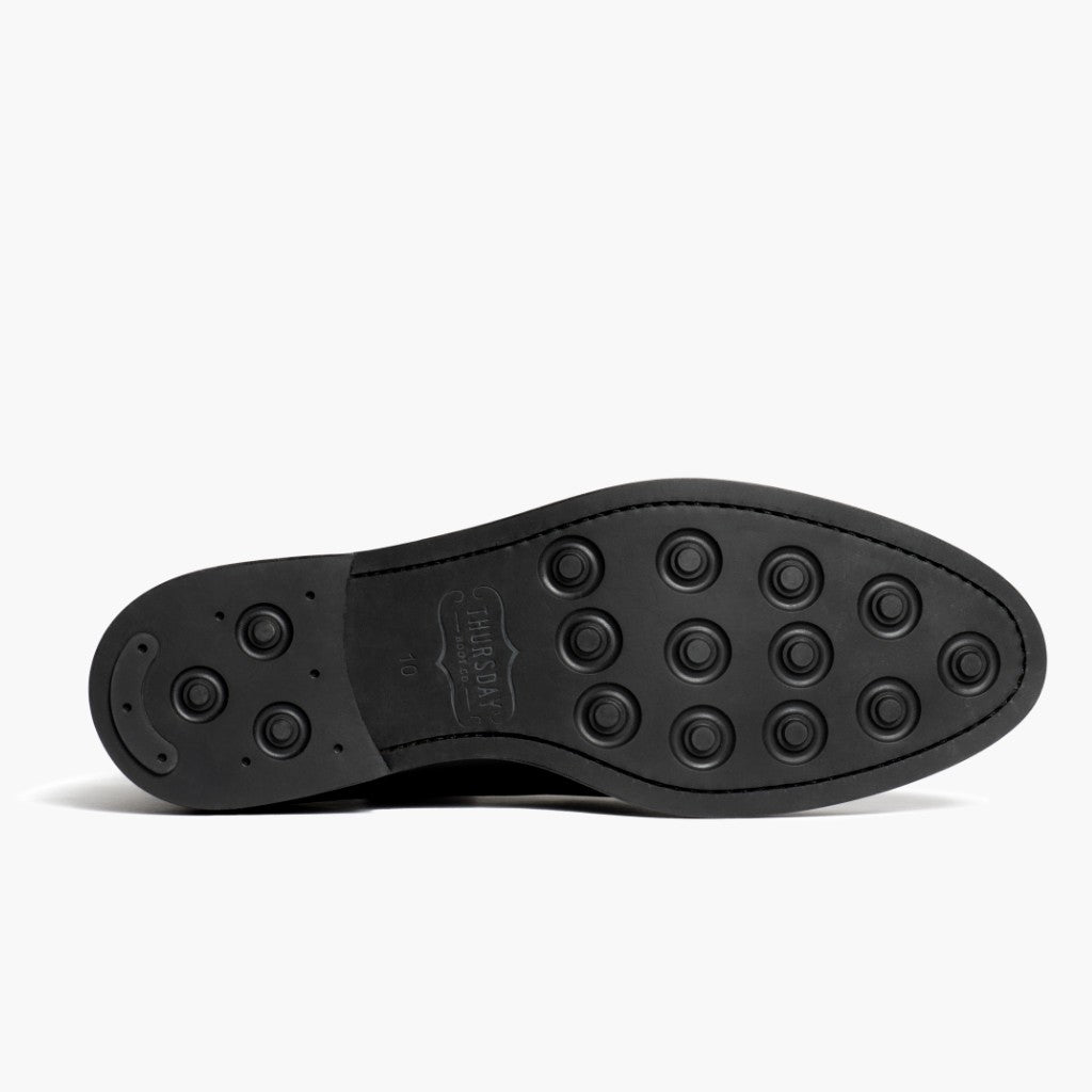 High-Traction Rubber Outsole & Lug Tread Pattern on Cadet Negro Botas de cuero para Hombre