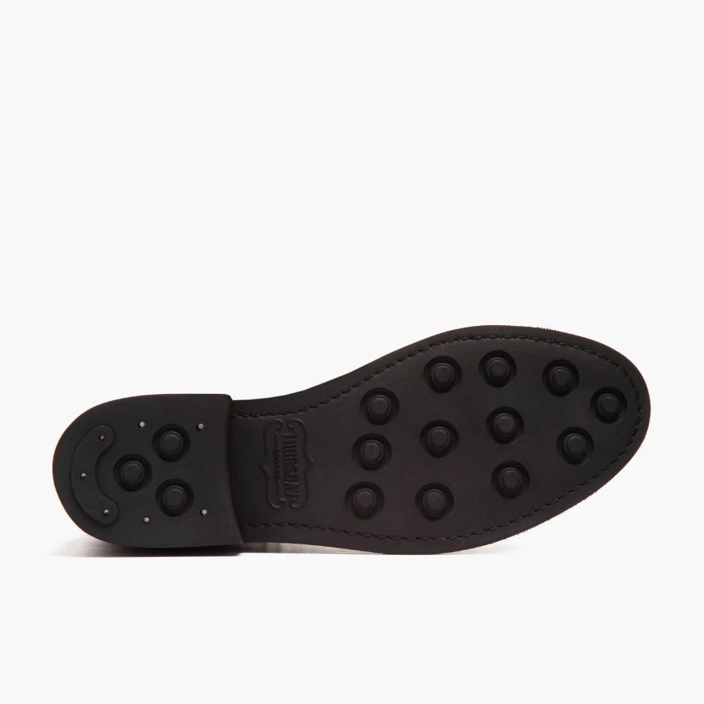 High-Traction Rubber Outsole & Lug Tread Pattern on Captain Whisky Botas de cuero para Mujer