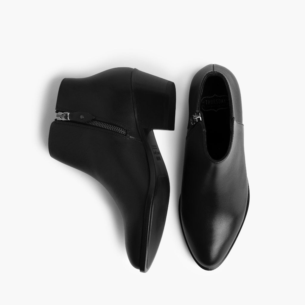High-Traction Rubber Outsole & Lug Tread Pattern on Downtown Negro Botas de cuero para Mujer