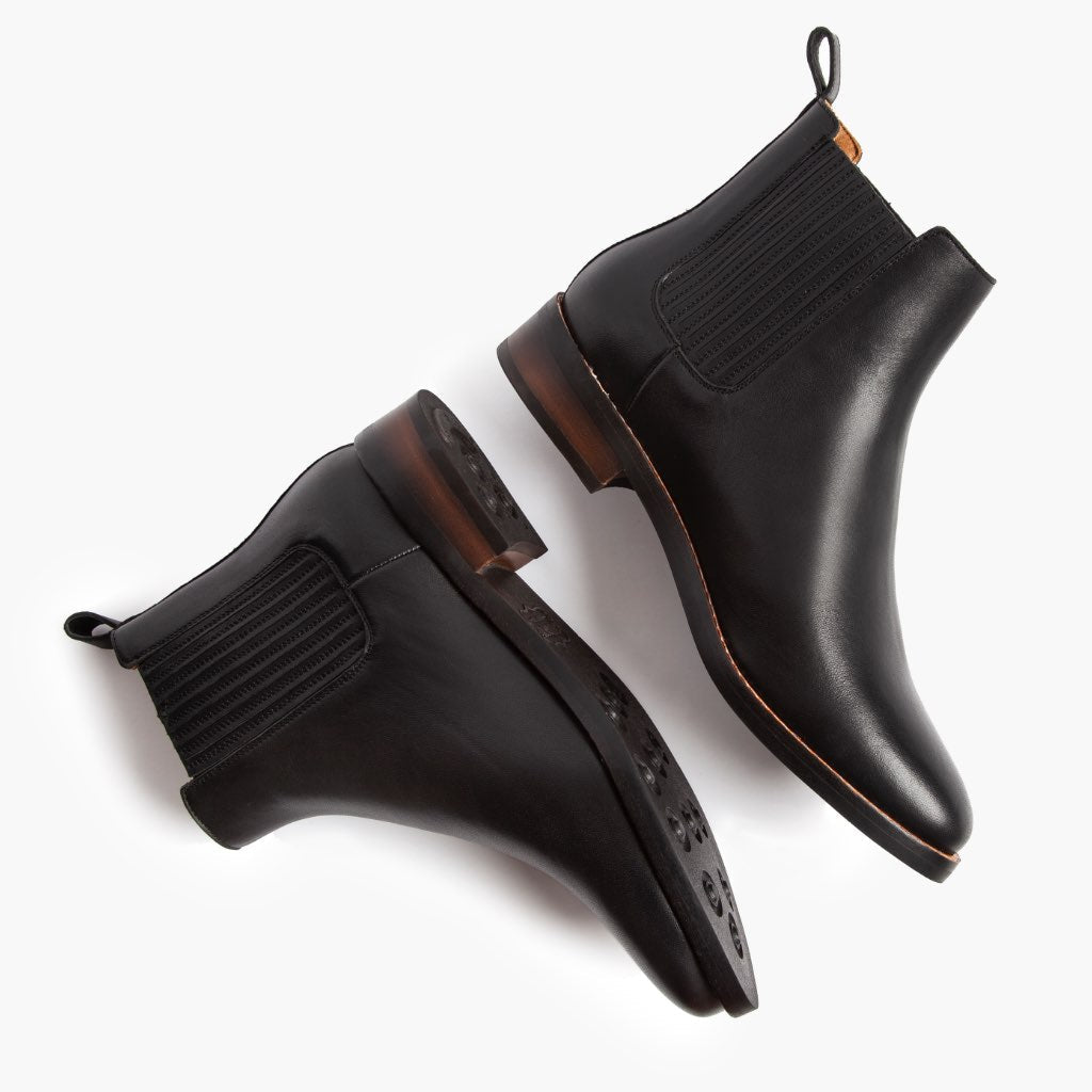 High-Traction Rubber Outsole & Lug Tread Pattern on Dreamer Negro Botas de cuero para Mujer