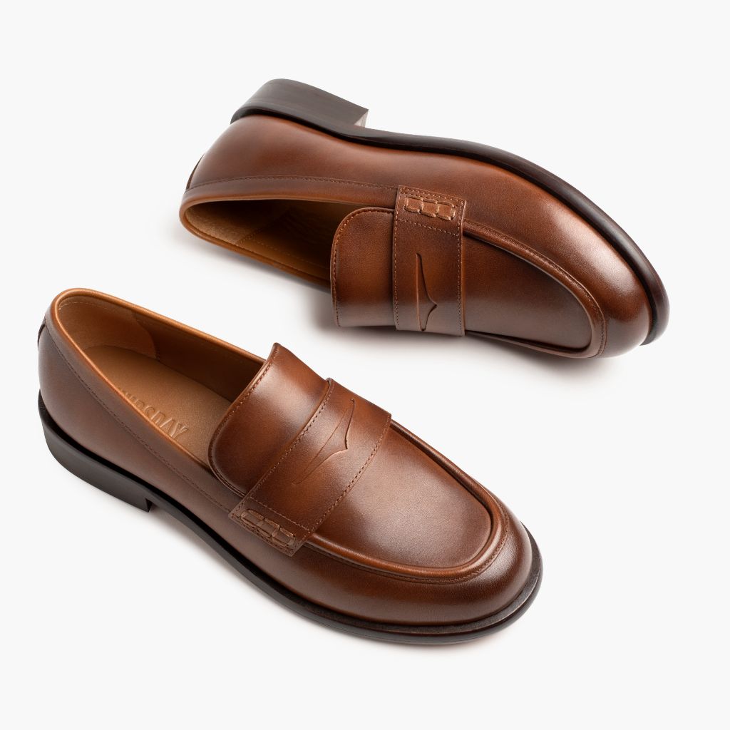 High-Traction Rubber Outsole & Lug Tread Pattern on Dress Penny Pecan Botas de cuero para Mujer