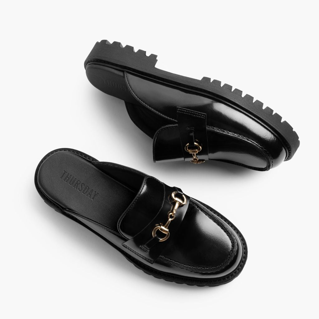 High-Traction Rubber Outsole & Lug Tread Pattern on Penny Mule Negro & Gold Mocasines de cuero para Mujer