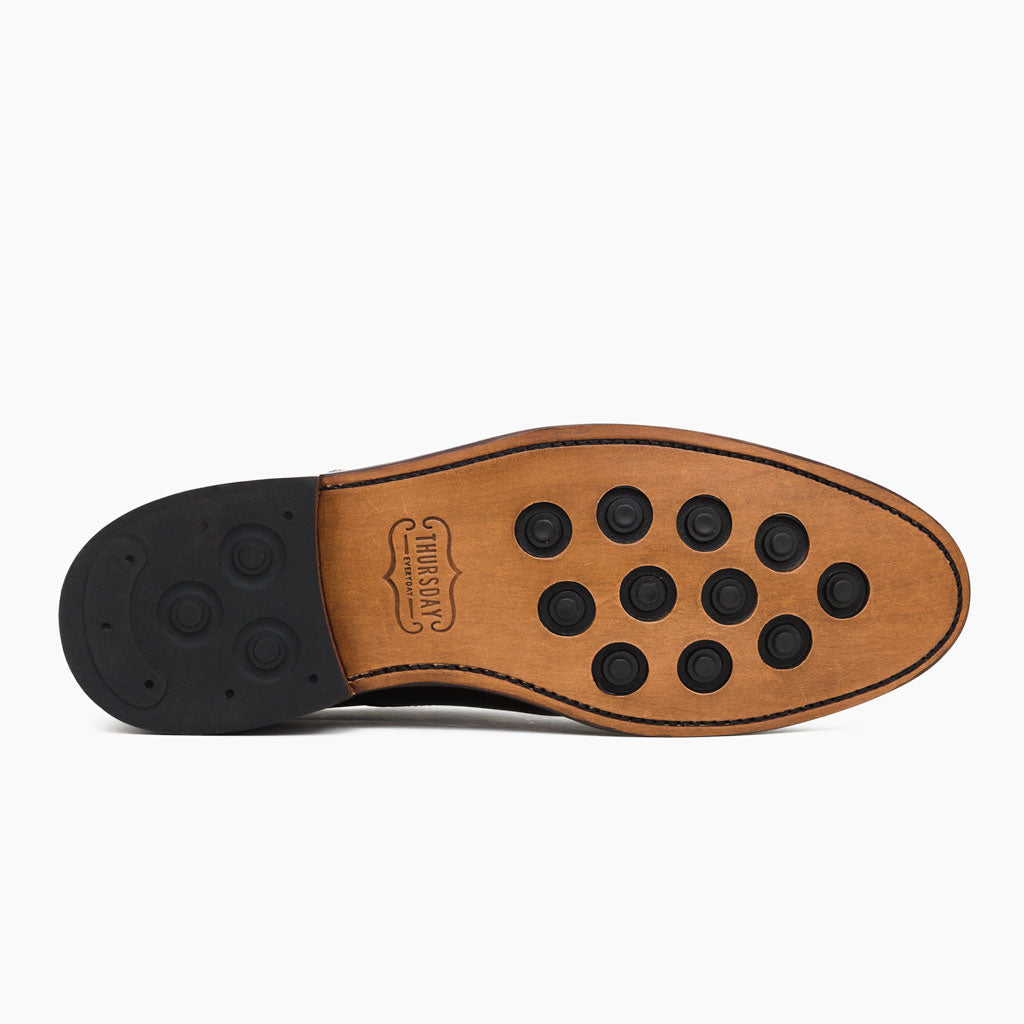 High-Traction Rubber Outsole & Lug Tread Pattern on Cavalier Negro Botas de cuero para Hombre