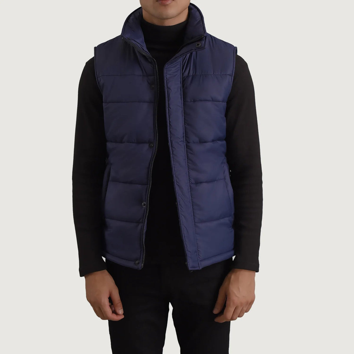 
Bryan Azul Chaleco acolchado para Hombre in Blue Full-Grain Leather - Vista frontal y silueta entallada | Comprar online