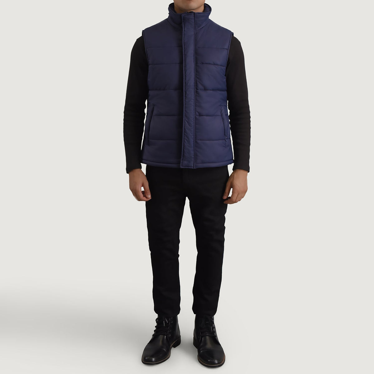 
Bryan Azul Chaleco acolchado para Hombre - Vista lateral mostrando el corte ergonómico de mangas