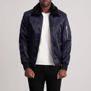 Clyde B-15 Azul Cazadora Bomber de Cuero para Hombre - Vista de perfil lateral con corte ergonómico de manga