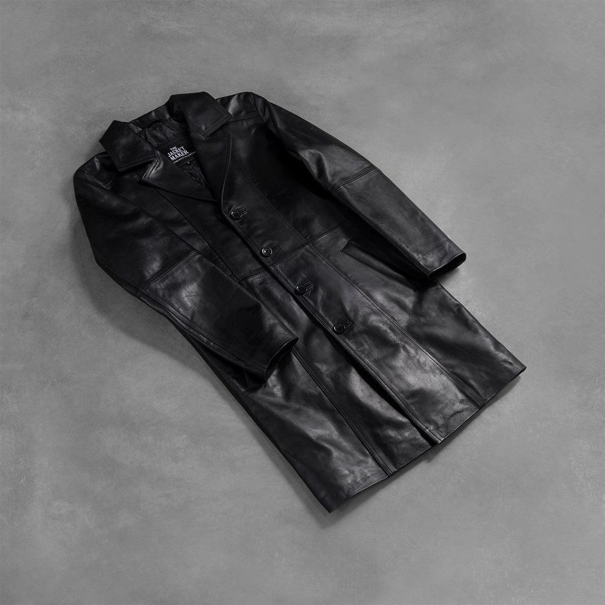 Open hem &amp; Hem Craftsmanship Construction Detail on Men's Don Long Negro Abrigo de Cuero para Hombre