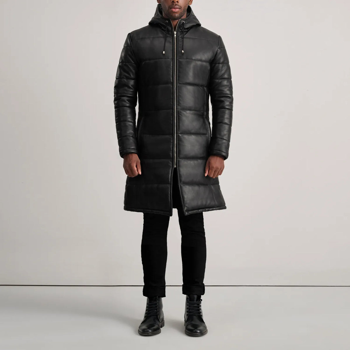 
Floyd Tan Hooded Leather Puffer Coat - Vista lateral mostrando el corte ergonómico de mangas
