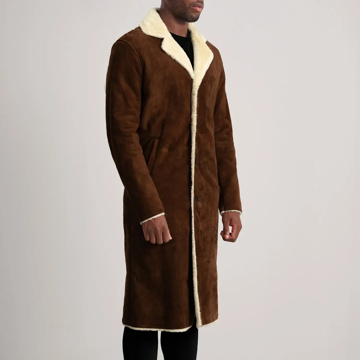 
Brown Goatskin Suede Aviator Jacket - Vista posterior con hombros definidos y bajo impecable