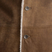 
Vista de detalle of Notch & Button Hardware on Kolby Distressed Brown Shearling Long Coat