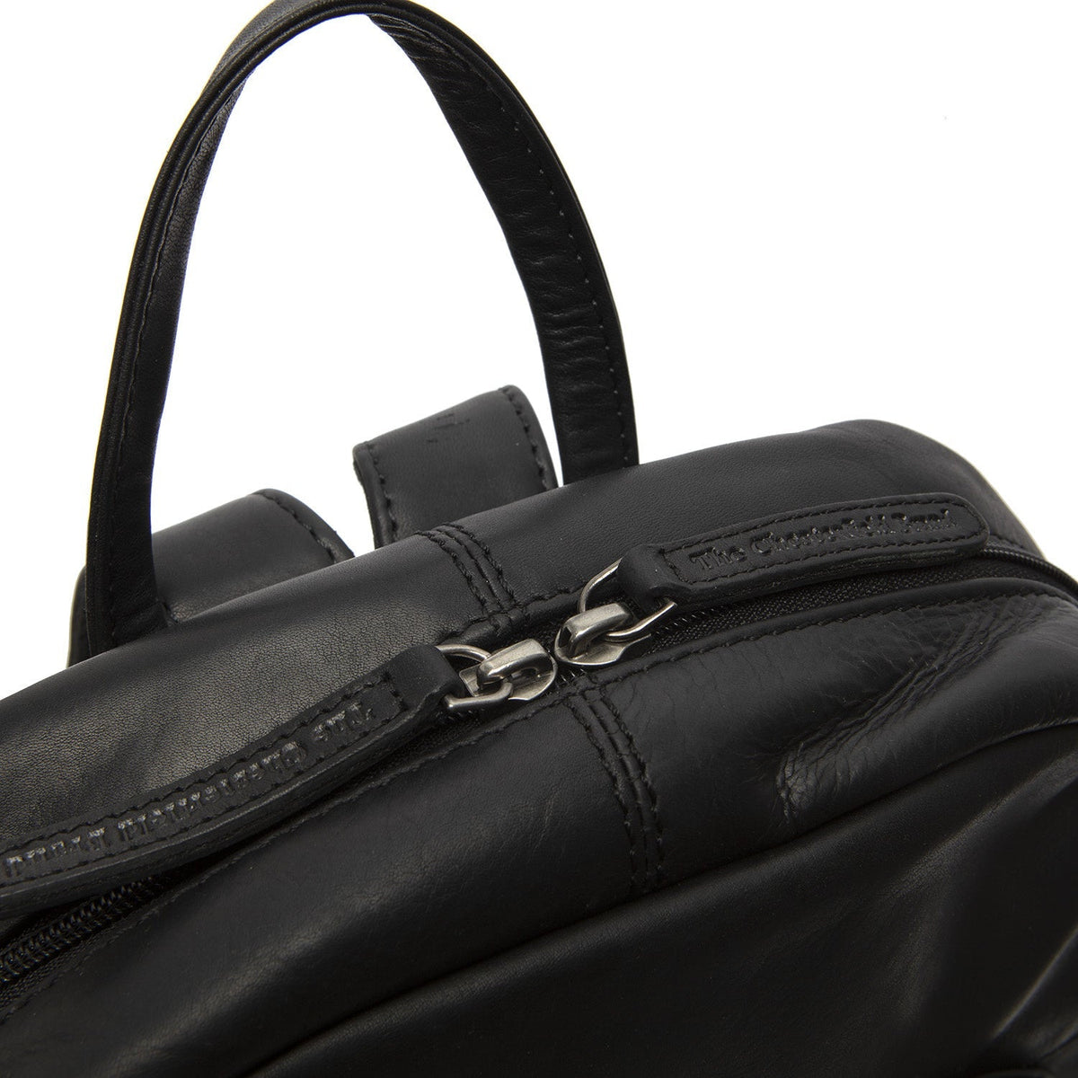 
Solid Antique Brass Hardware & Heavy-Duty Dual Zipper Detail on Santana Cuero Flor Integral Backpack