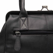 Dorin Full-Grain Leather Handbag para Mujer - Vista de perfil lateral con corte ergonómico de manga