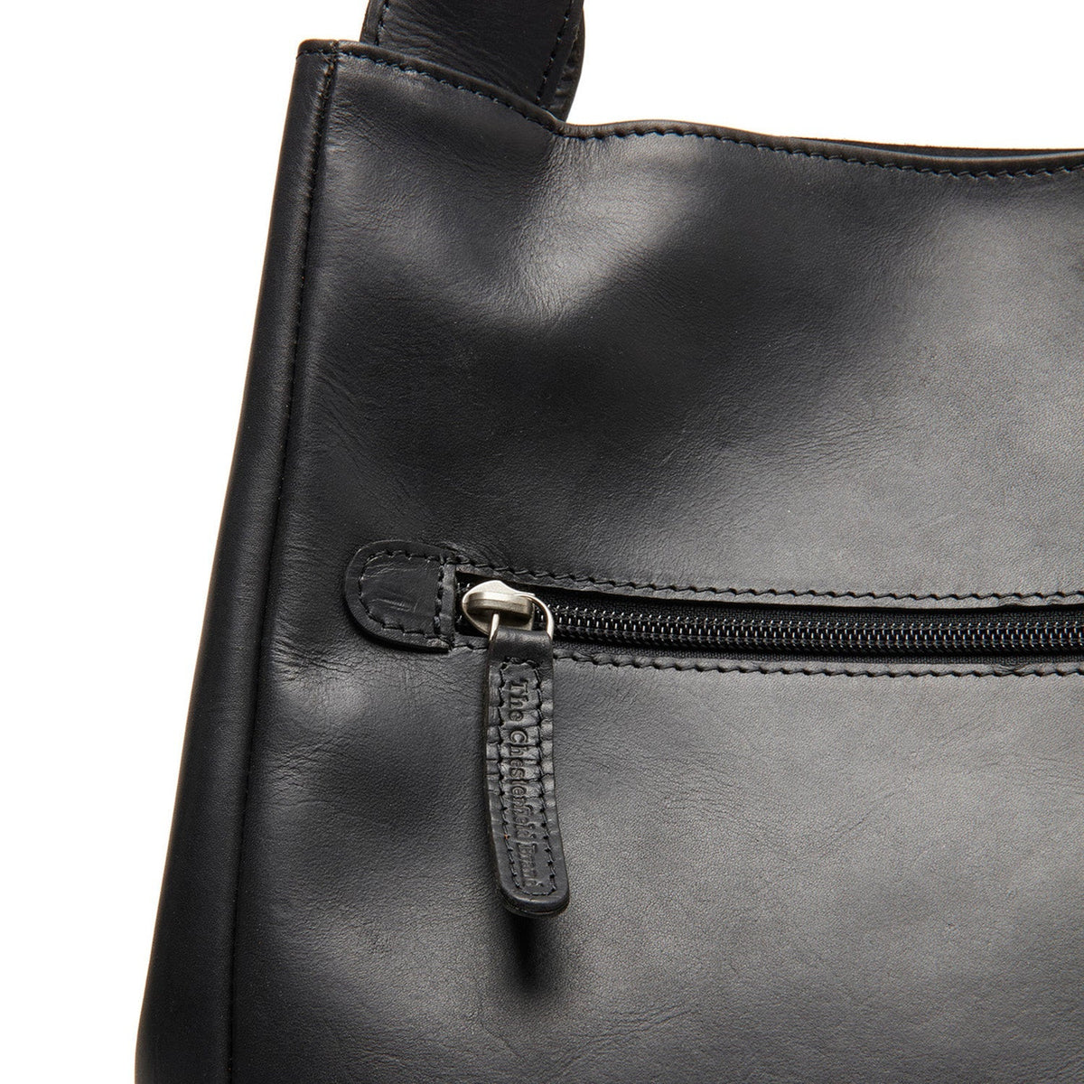 Fioline Full-Grain Leather Handbag - Vista de perfil lateral con corte ergonómico de manga