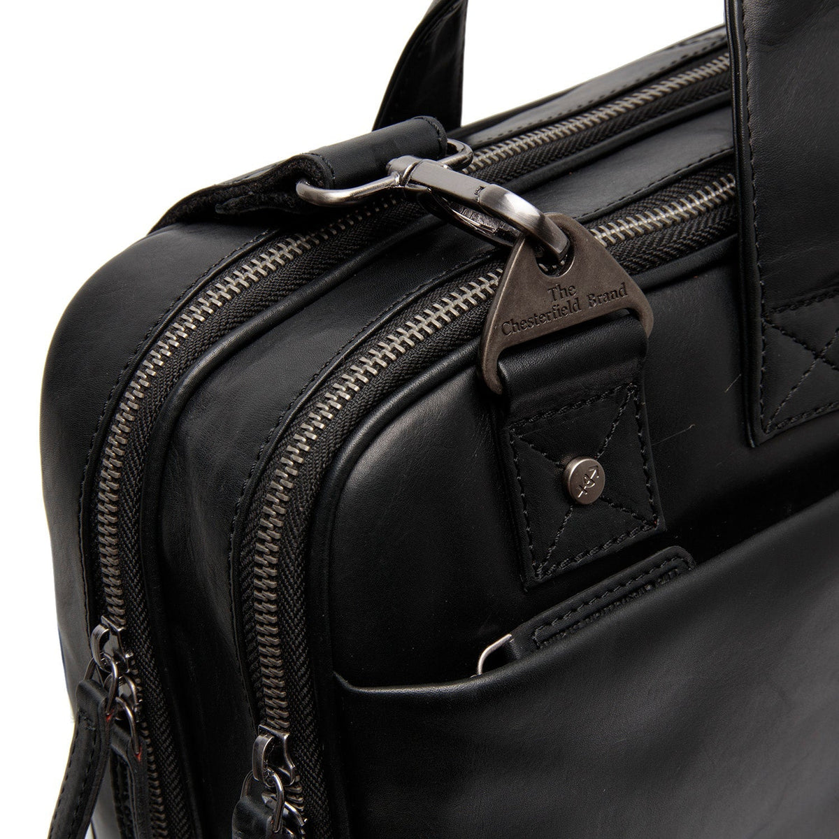 
Solid Antique Brass Hardware & Heavy-Duty Dual Zipper Detail on Iseo Maletín para portátil de cuero flor