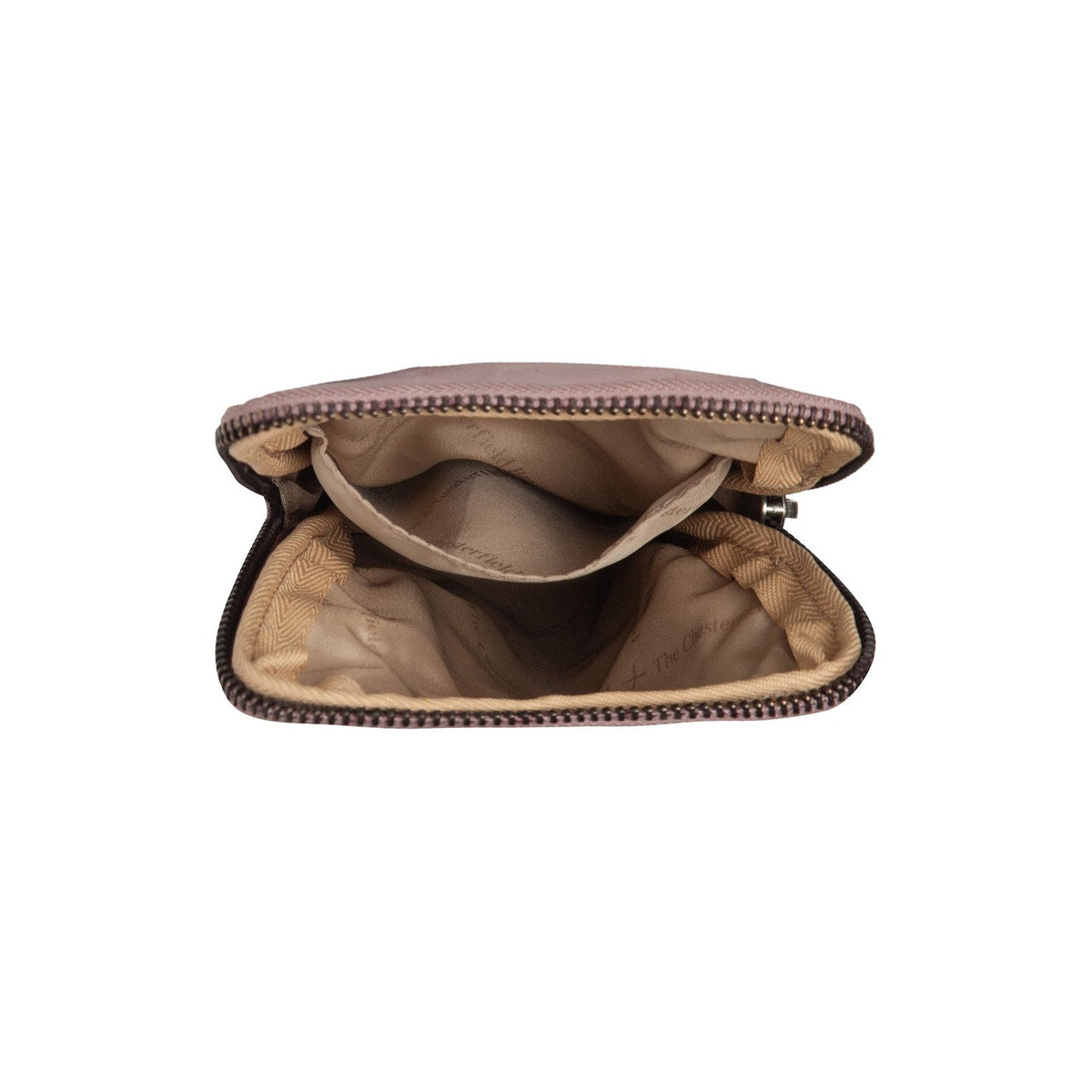 Salta Full-Grain Leather Phone Bag - Vista lateral mostrando el corte ergonómico de mangas