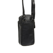 Styled Fit Perspective of Valdes Full-Grain Leather Phone Bag para Mujer on Model - Natural Daylight Drape