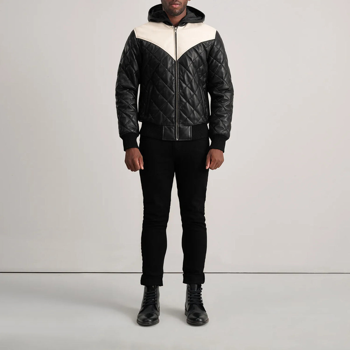 
Norman Tan Hooded Bomber Leather Puffer Jacket - Vista lateral mostrando el corte ergonómico de mangas