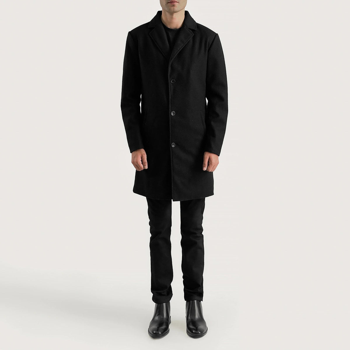 
Petrillo Negro Wool Single Breasted Abrigo de Cuero para Hombre - Vista lateral mostrando el corte ergonómico de mangas
