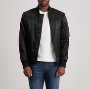 
Quinton MA-1 Negro Chaqueta Bomber de Cuero para Hombre - Vista lateral mostrando el corte ergonómico de mangas