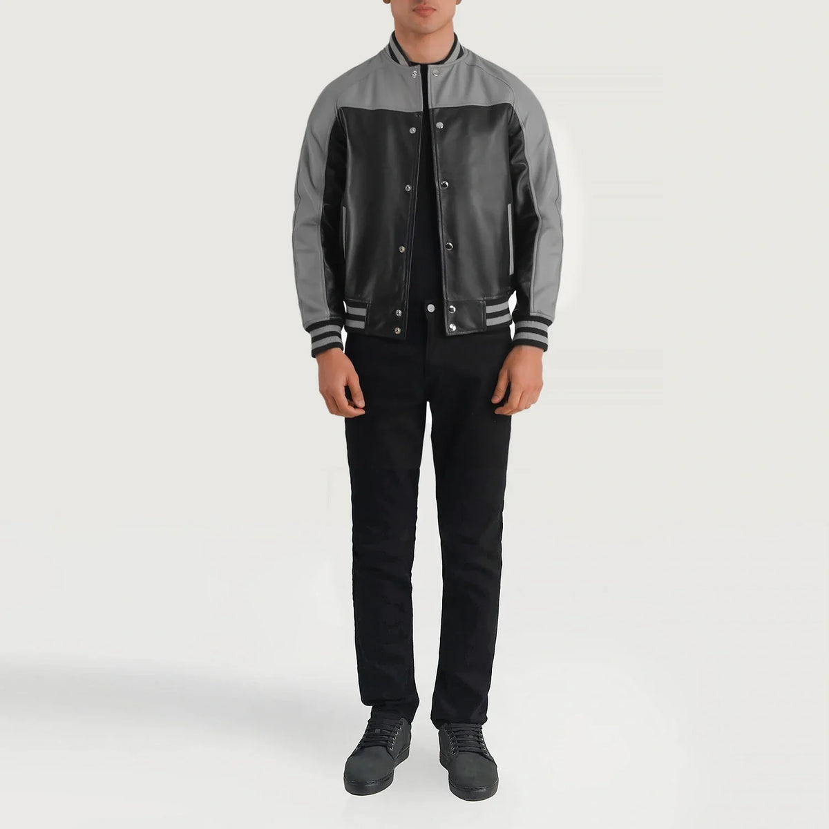 Terrance Black &amp; Red Leather Varsity Jacket - Vista de perfil lateral con corte ergonómico de manga